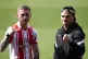 Michael Magnesi (right) and Ryan Garner face off following the Queensberry's 'Marching In' launch press conference at St Mary's Stadium, Southampton, April 22, 2026