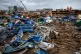 In this photo released by Xinhua News Agency, rescuers conduct work at a tornado-hit logistics park in Huangzhou District of Huanggang City 