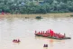 In this drone photo released by Xinhua News Agency, rescuers evacuated students trapped in the aftermath of tropical storm Maysak in Guigang City, southern China's Guangxi Zhuang Autonomous Region, July 9, 2026