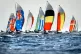 A fleet of boats from around the world compete in a men's skiff event sailing race Sunday July 28, 2024, during 2024 Summer Olympics sailing competition in Marseille, France
