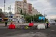 A sapper examines the impact site of a Russian missile in a residential area of Kyiv, July 11, 2026