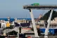 A vehicle sits short of a section of the Morandi highway bridge that collapsed on Aug. 15, 2018, in Genoa, northern Italy