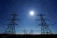Electricity pylons run across Romney Marsh in Kent, August 26, 2022
