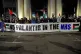 Health workers form a blockade in Soho Square during a protest outside the London headquarters of US tech giant Palantir, December 21, 2023