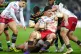 Scarlets' Fletcher Anderson is tackled during the Champions Cup match at cinch Stadium at Franklin's Gardens, Northampton, January 18, 2026