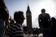 People walking over Westminster Bridge with the Elizabeth Tower, or Big Ben, and the Houses of Parliament in the background in Westminster, central London, June 22, 2026
