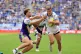 Leeds Rhinos' Ash Handley is tackled by Bradford Bulls' Eliot Peposhi during the Super League match at the Hill Dickinson Stadium, Liverpool, July 5, 2026