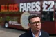 Prime Minister Andy Burnham speaking to members of the media in front of a FirstGroup bus during a visit to a bus station in Bath, Somerset to highlight what the government is doing to help families with the cost of living, July 22, 2026