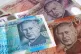 A view of £5, £10, £20 and £50 bank notes
