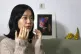 Screenwriter Zhou Xiaoxuan speaks during an interview with t