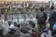 Polish troops line the barbed wire fence keeping out refugee