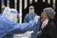 A medical worker from eastern China's Anhui Province takes a