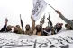 Taliban fighters celebrate one year since they seized the Af