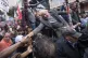Brazil's former President Luiz Inacio Lula da Silva shakes h