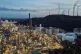 Wind turbines turn on top of a dump next to the 'BP Refinery