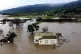 Floodwaters surround a home in the Chualar community of Mont