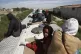 People travel on a freight train, arriving in Ciudad Juarez,