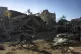 Palestinians search for bodies and survivors in the rubble o