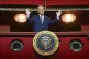 US President Donald Trump stands in the presidential box as 