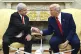 US President Donald Trump (right) shakes the hand of Israel'