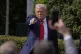 US President Donald Trump gestures to the crowd as he depart