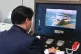 A South Korean government official communicates with a North