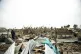 A man searches through the rubble after Tropical Cyclone Ida