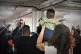 Migrants and crew of the Ocean Viking celebrate being given 