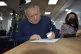 Former communist MP Abu Karwan signs the petition