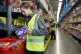 A staff member packs mince pies in Ocado's Customer Fulfilme