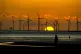 The sun sets behind Burbo Bank wind farm