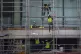 Construction workers on a residential building in Canary Wha
