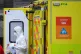 A paramedic wearing personal protective equipment (PPE) exit