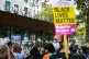 Protesters outside New Scotland Yard in London, as part of a
