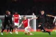 AT EASE: Arsenal’s Martin Odegaard (centre) cuts through p