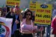 People take part in a demonstration against the dismissal of