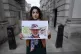 Roxanne Tahbaz, holds a picture of her father Morad Tahbaz, 
