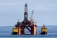 The oil platform Stena Spey is moved with tugboats amongst o