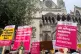 Demonstrators outside the Royal Courts of Justice, central L