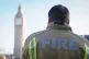 A firefighter in Parliament Square, central London.