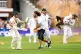 Ben Stokes (centre) grabs a JSO protestor while Johnny Bairs