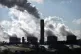 Smoke from the incinerator chimney and drift rising out of t