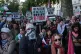People take part in a Palestine Solidarity Campaign rally on