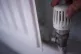The temperature control of a radiator in a domestic home