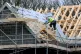 Roof workers building new houses in Derbyshire