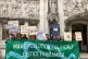 Environmental activists from Foil Vedanta hold a banner outs
