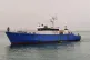An unnamed fishing boat arrives into Tripoli with refugees o