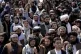 Taliban fighters and supporters celebrate the first annivers
