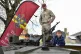 Children play outside the National Military Musem, funded by